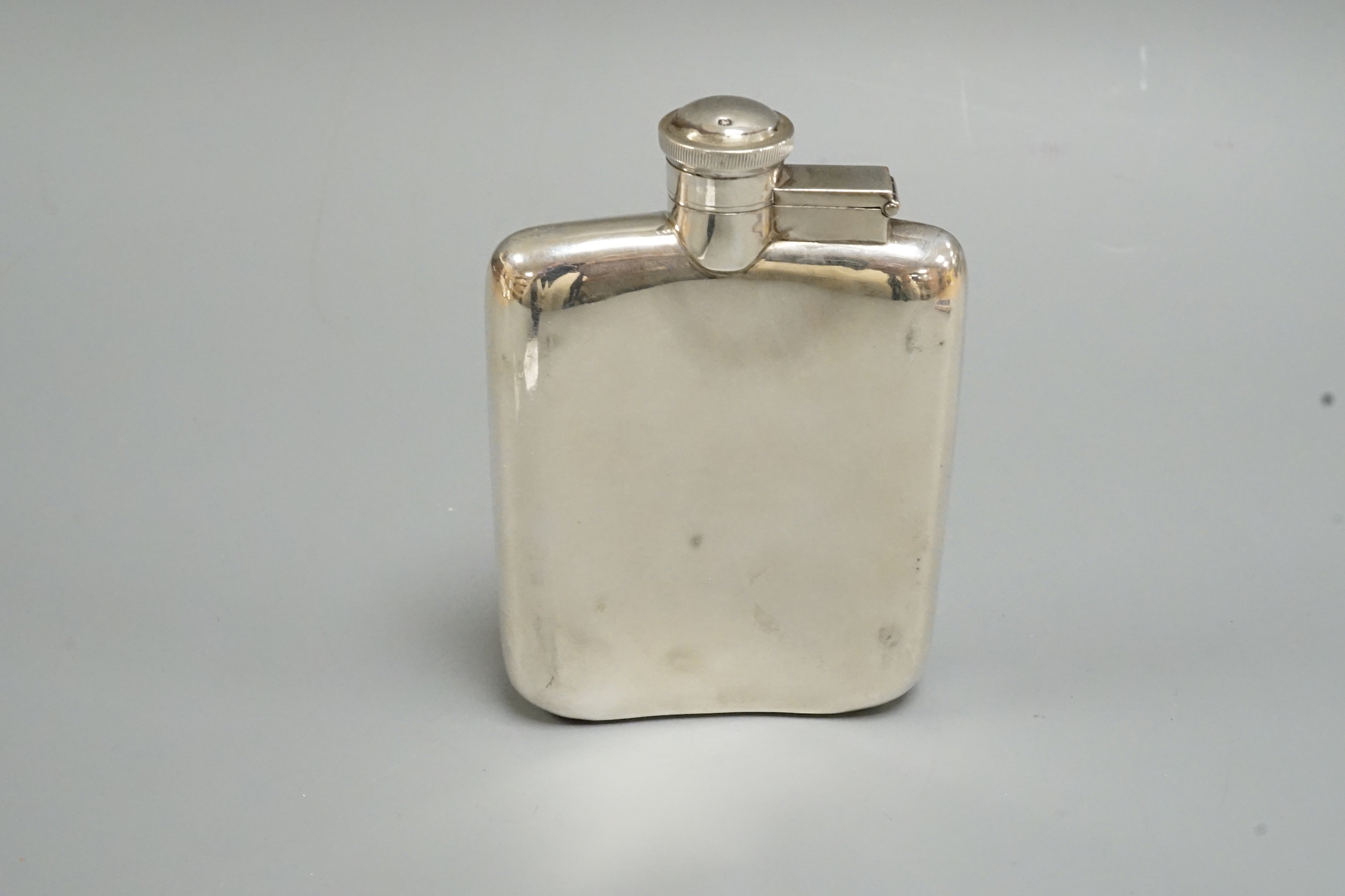 A George VI silver hip flask, James Dixon & Sons, Sheffield, 1939, 11.9cm.